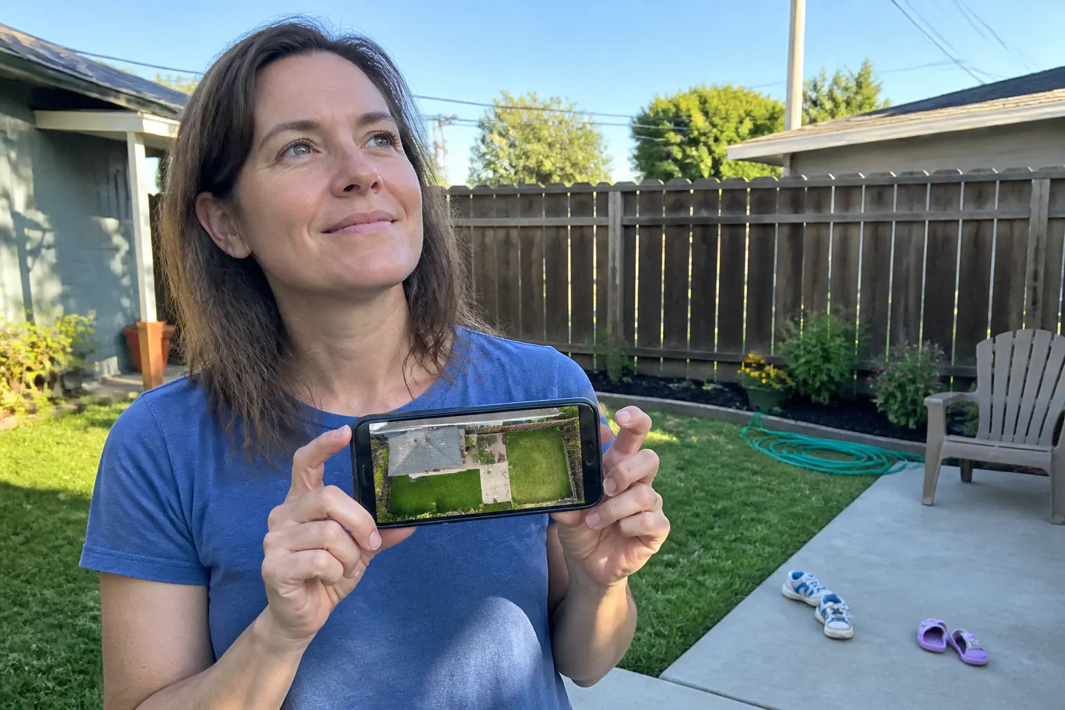 The same scene from above, streamed live to the phone from the drone